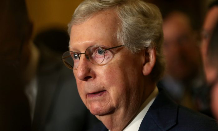 mitch backs resolution
