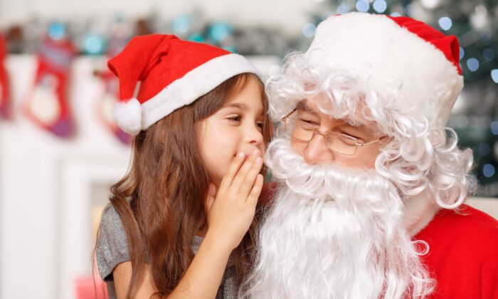 girl visiting santa 700x420 1