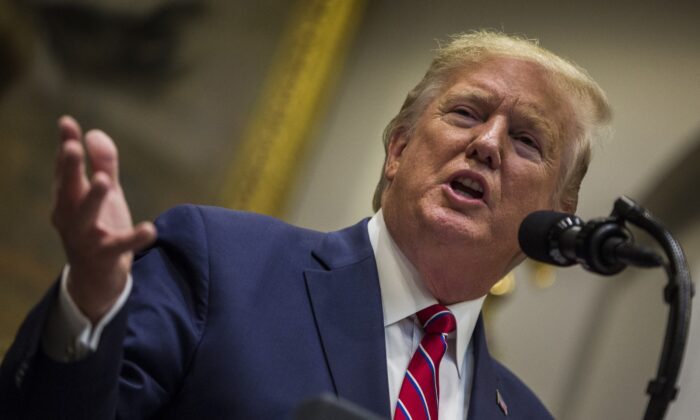 trump in blue suit 700x420 1