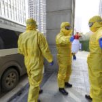 ‘Do Not Travel’: US State Department Posts Highest Alert for China Amid Virus Outbreak | USNN World News wuhan funeral workers 700x420 1
