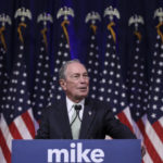 Charles Hurt: Mike Bloomberg 'dangerous' ahead of Super Tuesday | USNN World News michael bloomberg stands in front of flag 700x420 1