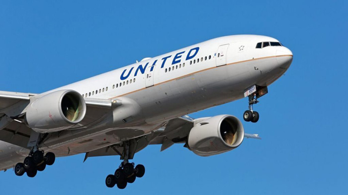 Doctor flying with United Airlines shares photo of packed flight, says passengers were 'scared,' 'shocked'