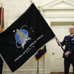 Space Force flag unveiled in Oval Office, presented to Trump