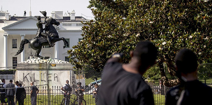 Officers clear protesters from outside White House, as ‘Defund the Police’ graffiti removed