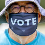 Long lines accompany start of early voting in Virginia