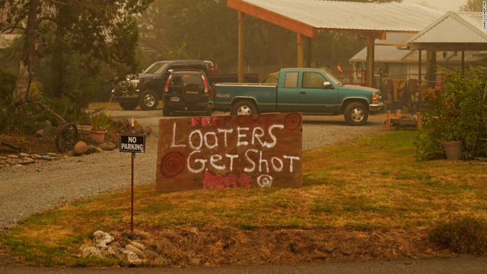 Oregon drivers stopped at gunpoint by groups protecting wildfire ravaged properties from looters