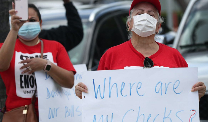 Number of Americans filing for jobless aid falls to 787,000, lowest since March