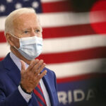 Biden suggests people were able to quarantine because 'some Black woman was able to stack the grocery shelf' in viral clip