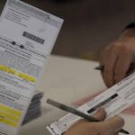 Wisconsin Elections Commission Agrees to Order Partial Recount After Trump Request | USNN World News The Wisconsin Elections Commission on Wednesday night issued an order to recount ballots in two counties following a request by President Donald Trump’s campaign. Commissioners in a video teleconference on Wednesday argued for nearly six hours before ultimately agreeing to conduct the recount. “An order will be issued mandating that the recount take place. This is not a discretionary decision. This is simply what will happen,” Chairwoman Ann Jacobs, a Democrat, said at the beginning of the hearing. But members of the commission, which has three Republicans and three Democrats, debated for hours over how the recount would be conducted. Some said state law governing a recount contained ambiguities. Republican Commissioner Dean Knudson said he believed the commission should issue guidance to canvassers that they should set aside ballots that had a correction made to the witness address. “They’ve essentially filed in advance a mass objection to all such ballots, that in this era of pandemic, and all our concerns for public health, and so on, it’s kind of ridiculous to have the observers have to be close enough to see each one and object individually to each one, when instead, we could give guidance at the outset that says, ‘hey, those need to be set aside, because those are going to be under litigation,'” Knudson said. “I don’t necessarily think that as a commission, we should be pre-determining what ballots are going to be questioned or what envelopes are going to be questioned. That’s not our position,” Democrat Commissioner Julie Glancey said, though the Republican Party of the Trump campaign could recommend canvassers do so. Wisconsin Counts Poll workers check-in a box of absentee ballots at Sun Prairie High School in Sun Prairie, Wisconsin, on Nov. 3, 2020. (Andy Manis/Getty Images) Knudson sparked stronger pushback when he wondered whether clerks sent out thousands of ballots that weren’t requested by voters as he proposed including written applications in the recount. “I am shocked and offended that you have implied in any way that clerks in Madison and Milwaukee have sent out thousands of unrequested ballots,” Jacobs said. “I think that’s absurd. I think it’s factually bizarre.” “What we ought not be doing is watering that plant of baloney,” she added, referring to allegations by the Trump campaign. The commission eventually approved an order that made no reference to its recount manual, which has guidelines for how local officials should conduct recounts. Trump’s campaign earlier in the day filed a petition asking for recounts in Milwaukee and Dane counties because of alleged “illegally altered absentee ballots, illegally issued absentee ballots, and illegal advice given by government officials allowing Wisconsin’s voter ID laws to be circumvented.” “The Wisconsin Elections Commission directed Wisconsin municipal clerks to illegally alter incomplete absentee ballots contrary to Wisconsin law,” the campaign added. The commission has said clerks are required by guidance issued before the 2016 election to fix addresses. trump and biden Democratic presidential nominee Joe Biden (L) and President Donald Trump in file photographs. (Getty Images; Reuters) The campaign also alleged that clerks across the state issued absentee ballots to voters without requiring an application, in direct conflict with Wisconsin’s absentee voting safeguards. The campaign transferred $3 million to the state to cover the estimated cost of the partial recount. Democratic presidential nominee Joe Biden finished with 20,427 more votes than Trump, or 0.62 percent of the vote, according to unofficial statewide results. State law allows a candidate who ends up within 1 percent of the winner’s total to request a recount. If the margin is less than 0.25 percent, the state foots the bill, but if it’s between 0.25 percent and 1 percent, the requestee must. A full statewide recount can still be requested. The commission chair will on Thursday issue the recount order, triggering a 13-day recount clock. Recount boards can meet as soon as Nov. 19 and no later than Nov. 21. All recounts must be completed and results filed with the commission by noon on Dec. 1, a day that also marks the deadline for the commission to certify results from the election. “We understand the eyes of the world will be on these Wisconsin counties over the next few weeks,” Meagan Wolfe, Wisconsin’s chief election official, said in a statement. “We remain committed to providing information about the process and assisting our county clerks by providing facts on the mechanics of a recount and status updates.” Jack Phillips contributed to this report.