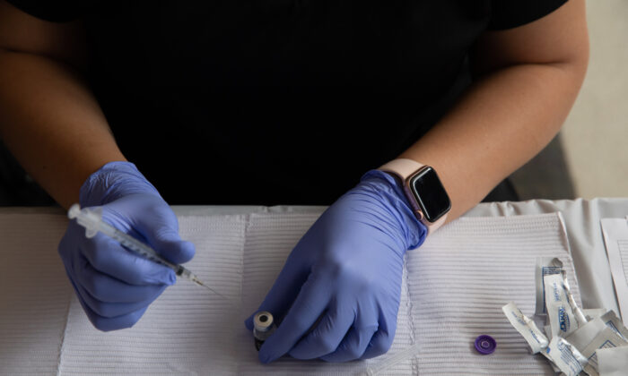 Michigan Health System Employees Sue Over Vaccine Mandate