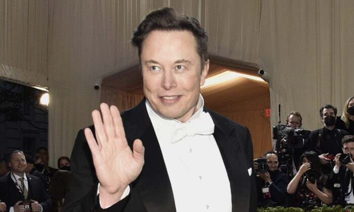 Musk Says Twitter Deal on Hold Over Spam Bots