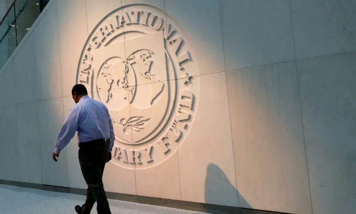 IMF Warns of Prolonged High Interest Rates, Urges Fiscal Tightening to Tackle Inflation
