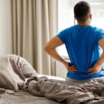 5 Effective Bedtime Stretches to Ease Back Pain | USNN World News 5 Effective Bedtime Stretches to Ease Back Pain